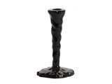 En blank sort lysestage med en snoet stilk og en ujævn, organisk formet base.