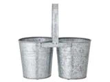 To galvaniserede metalspande, der er sat sammen med et fælles håndtag i midten.