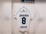 Hvid AGF Aarhus-fodboldtrøje med JØRGENSEN 8 på ryggen og et Andelskassen-sponsorlogo.