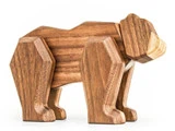 En legetøjsgorilla i træ med et minimalistisk, geometrisk design med kantede former og en glat finish.