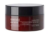 En 200 ml krukke med Meraki Body Butter mærket meadow bliss, designet til meget tør hud, med et sort låg og en mørkebrun beholder.