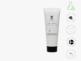 En tube Grums raw coffee hand scrub med ikoner for vegansk, allergivenlig, danskproduceret og cirkulært produktdesign på en hvid baggrund.