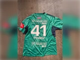 Grøn og sort sportstrøje med navnet PEVNOV og nummer 41 på ryggen, med logoer fra DET FAGLIGE HUS og SPORTS WORLD.