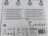 Emballage til STAR Trading LED-lyskæder med produktoplysninger, sikkerhedsinstruktioner på flere sprog, strømoplysninger og et installationsdiagram.