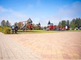 Familieferie for 6 i norsk bjælkehytte på Jambo Feriepark - minigolf, is og Fårup Sommerland tæt på