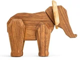 En elefantfigur i træ med glat finish og forenklede og geometriske former på krop, ben, hoved og ører.