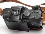 Jan Grarups udtjente Sony a7II kamera samt billede og bog