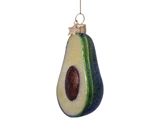 En glitrende avocadopynt, skåret i halve for at vise frøet, med en guldløkke og stjerne i toppen til ophængning.