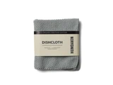 En foldet grå strikket bomuldskarklud med en etiket med teksten DISHCLOTH og HUMDAKIN på hvid baggrund.