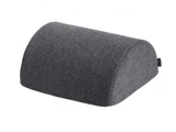 En grå, halvcylindrisk støttepude med stofbetræk, designet til ergonomisk komfort, vist på en hvid baggrund.