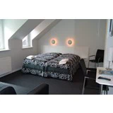 Overnatning for 2 personer med morgenmad i luksusværelse fra Frederikshavn Sømandshjem