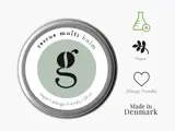 En dåse med rescue multi balm mærket vegansk og allergivenlig, med ikoner for vegansk, allergivenlig og Made in Denmark ved siden af.