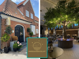 En murstensbygning med et skilt for Vadehavshotellet og et moderne restaurantinteriør med et stort træ med lyskæder i midten.