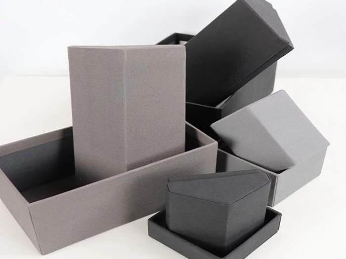 4 forskellige grå/sorte Pynte/opbevaringshuse design MENU