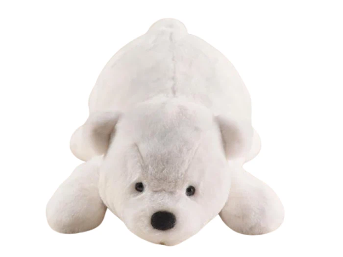 En hvid isbjørn i plys, der ligger fladt på maven med ansigtet fremad og har sorte øjne og en sort næse.