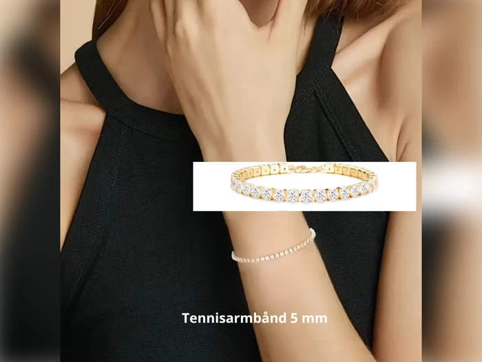 En person iført en ærmeløs sort top og et tyndt tennisarmbånd i guld med diamanter; under teksten står der Tennisarmbånd 5 mm.