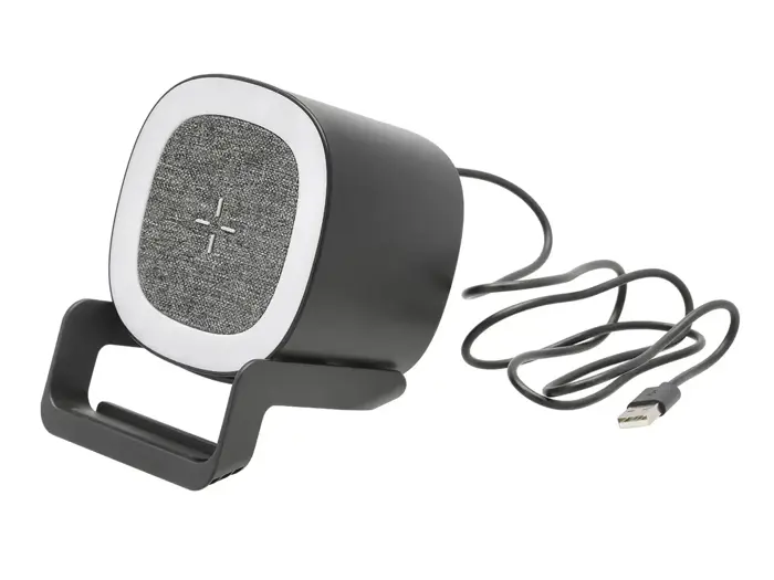 En sort kablet USB-højttaler med frontpanel i stof, en cirkulær hvid kant og en indbygget fod. USB-kablet er fastgjort og strækker sig udad.