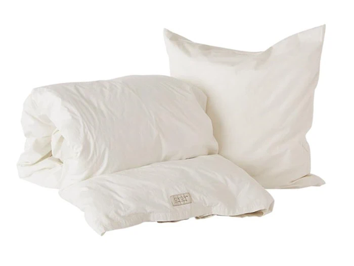 Nuku sengetøj junior I råhvid fra OYOY