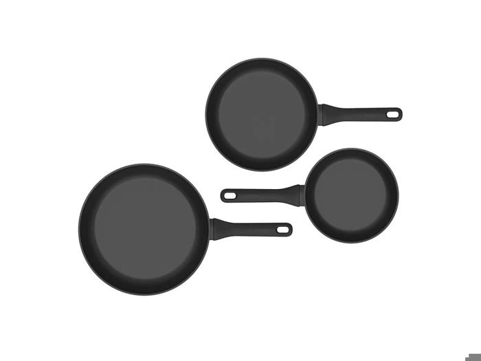 Tre mat-sorte non-stick-stegepander i forskellige størrelser, set ovenfra.