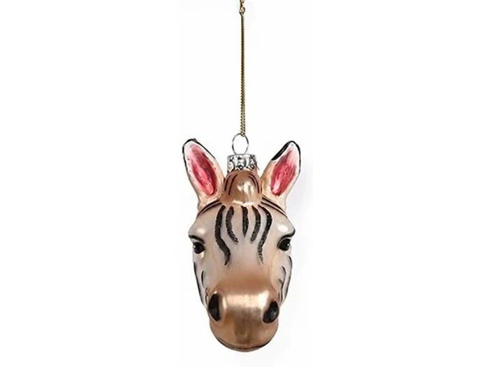 Julepynt af glas i form af et zebrahoved, der hænger i en guldtråd.
