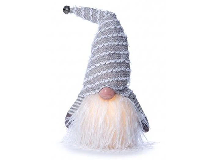 En lysende nissefigur iført en stribet spids hat med en klokke.
