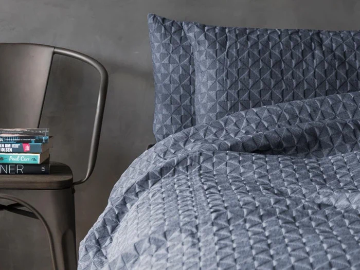 BUTTERFLY sengetæppe i mørkeblå fra Mette ditmer