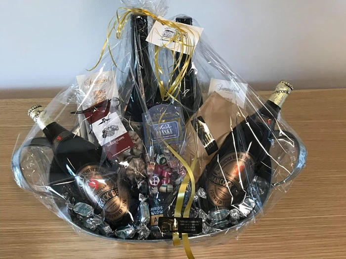 Gavekurv - Strøgets vinhandel skive