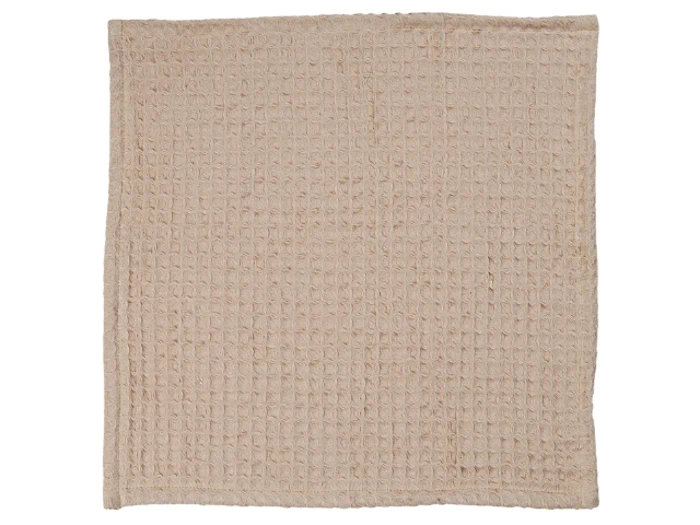 Beige, firkantet vaskeklud med vaffelmønster, vist fladt mod en hvid baggrund.