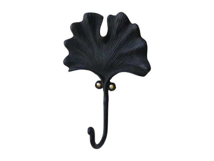 En sort vægknage designet til at ligne et ginkgoblad med en enkelt buet krog, der stikker ud fra basen.