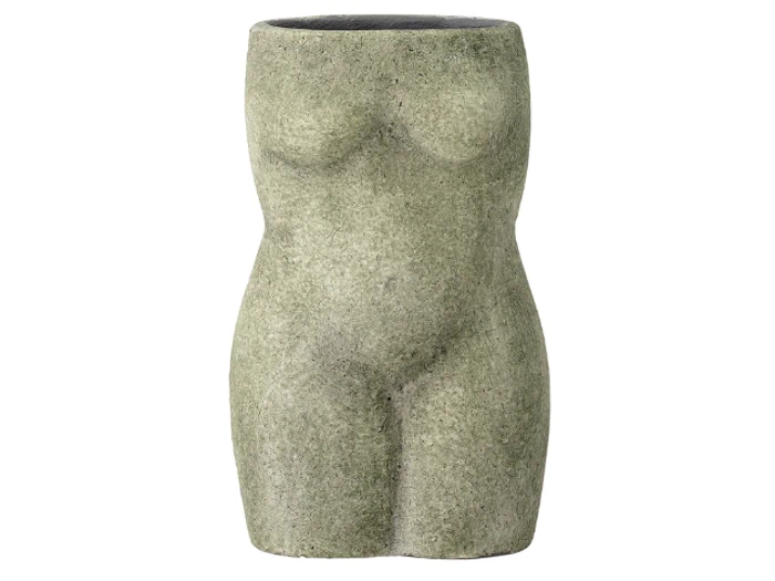 En stenskulptur formet som en kvindelig torso, med vægt på kurver og naturlig form, uden hoved, arme eller ben.