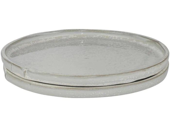 To stablede runde keramiktallerkener med let hævet kant, glaseret i en lys, spættet grå finish.