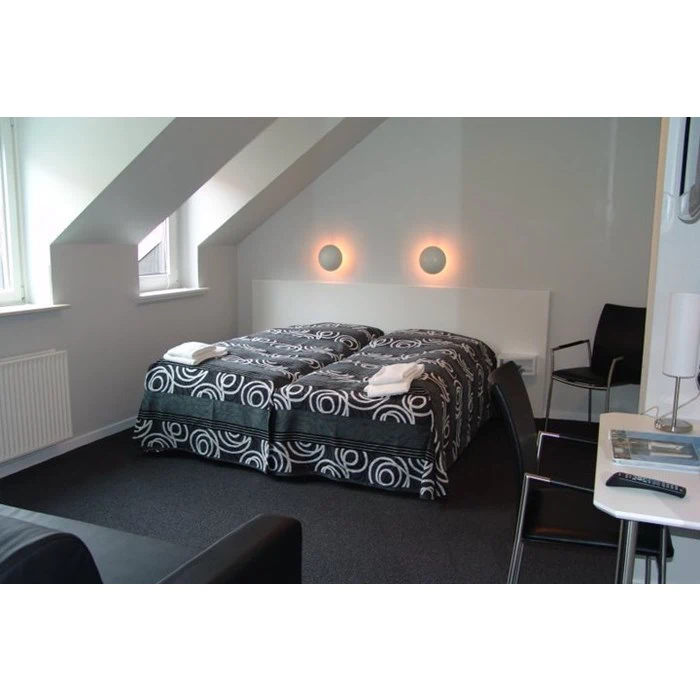 Overnatning for 2 personer med morgenmad i luksusværelse fra Frederikshavn Sømandshjem