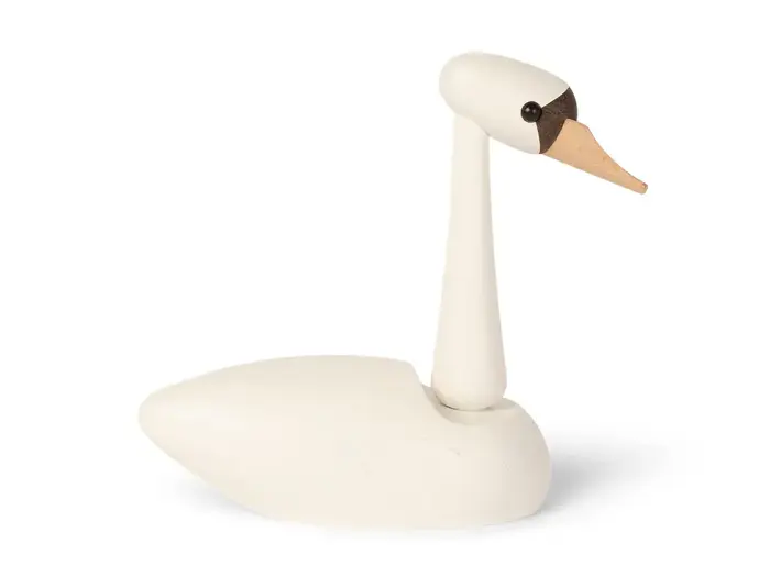 En minimalistisk, hvid svanefigur af træ med en lang hals, sorte øjne og et næb af naturligt træ på en almindelig hvid baggrund.